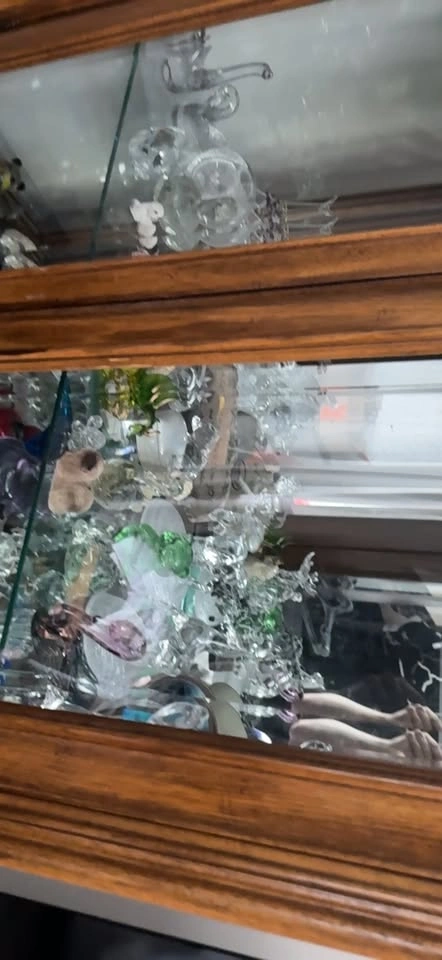 Glass Figurines in Display Cabinet - photo 2