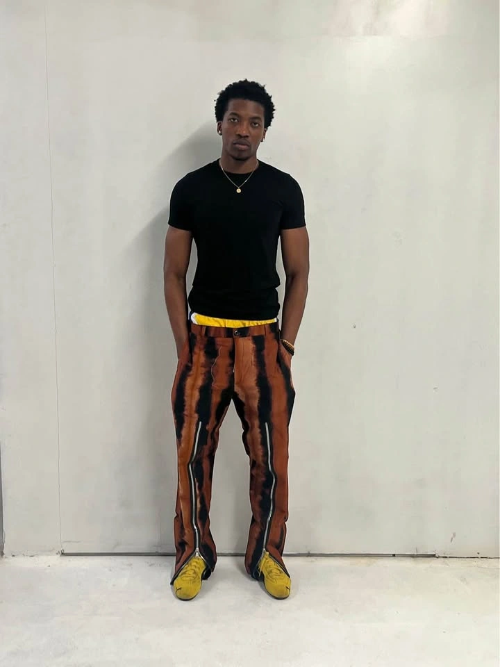 Orange and black pants with zipper design