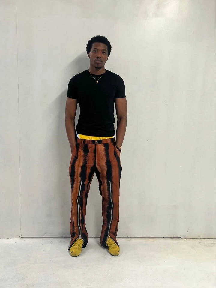 Orange and black pants with zipper design - photo 5