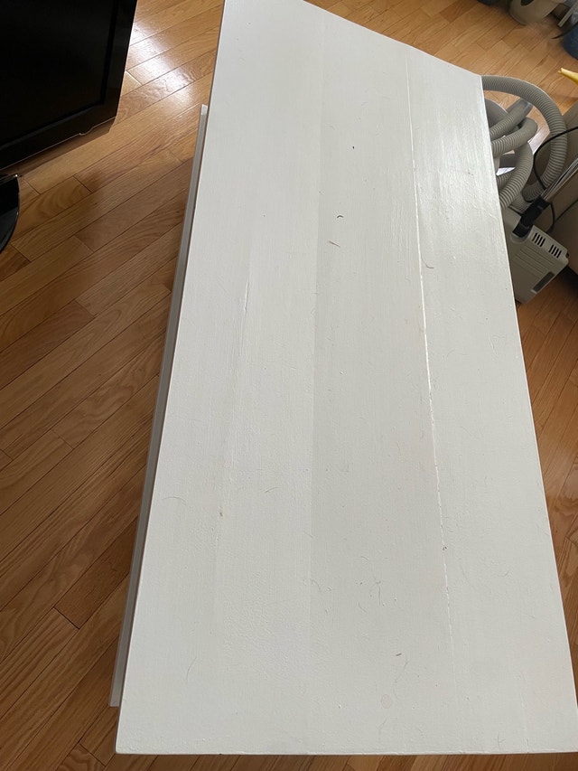 White wooden TV table