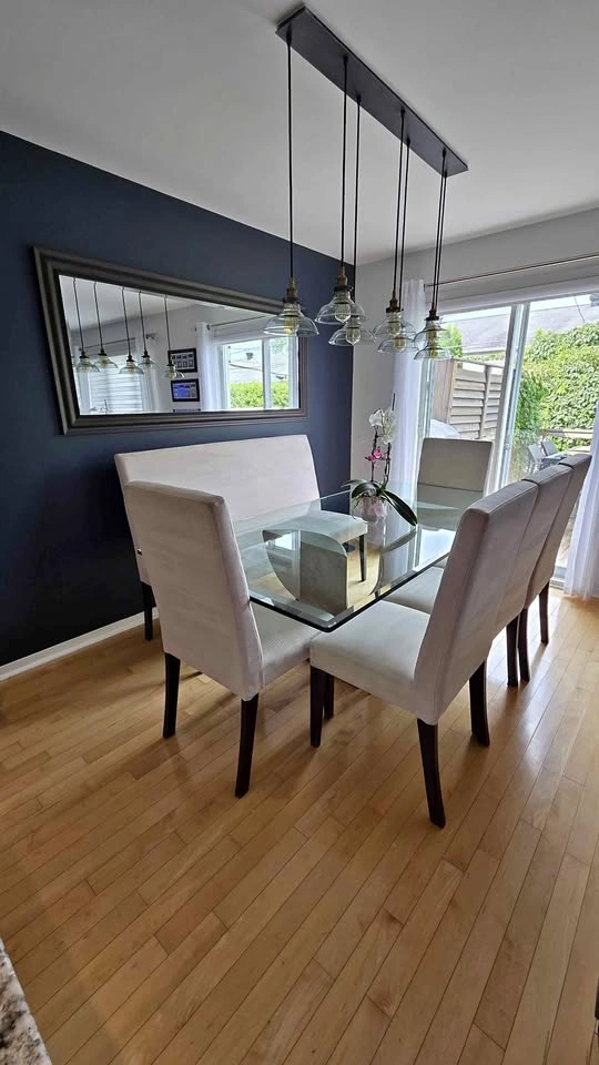 Glass dining room table with marble base