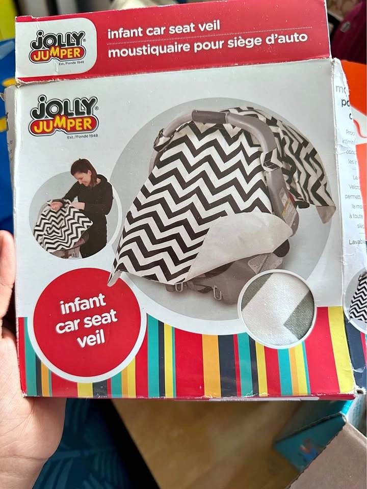 BNIB jolly jumper infant car seat veil