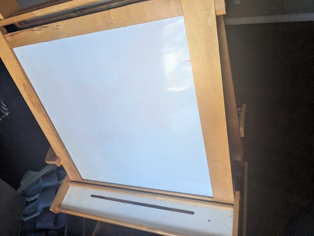 white board and black board at back