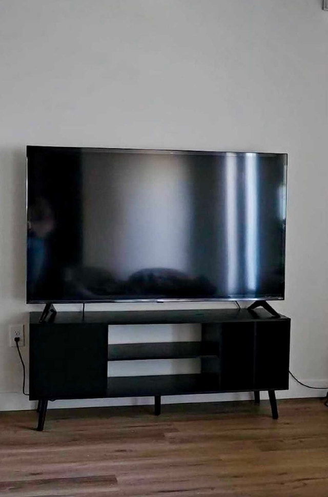 Philips 65-inch Roku TV with Stand & lights
