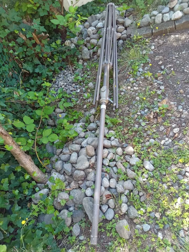 Patio umbrellas and poles ($20 each) - photo 2