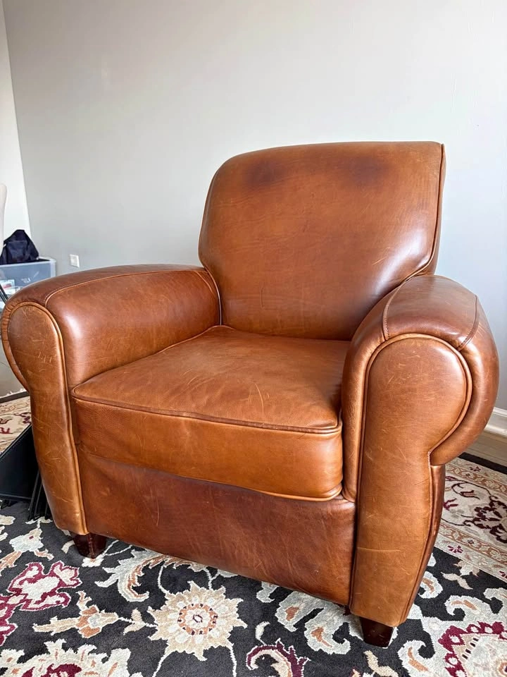 Upholstered Leather Armchair & Ottoman