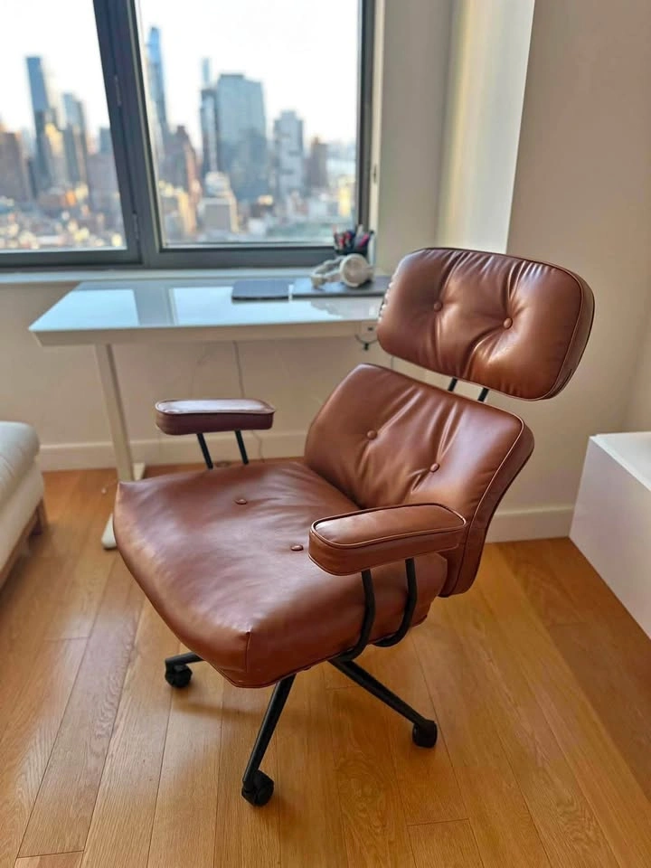 Fully reclining brown leather chair