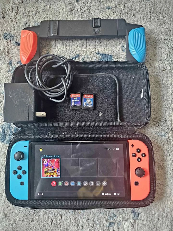 Nintendo Switch OLED Bundle with NeoGrip, Hori Case, and Games