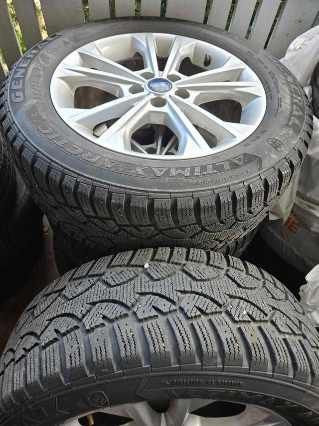 Set of four 235 55 17 Altimax General tires with ford wheels
