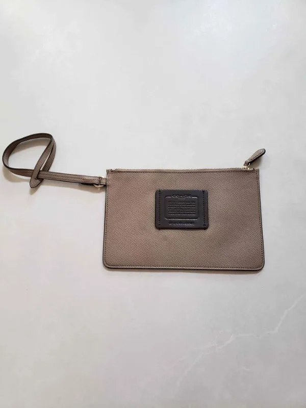 Large Nude Coach wristlet thumbnail