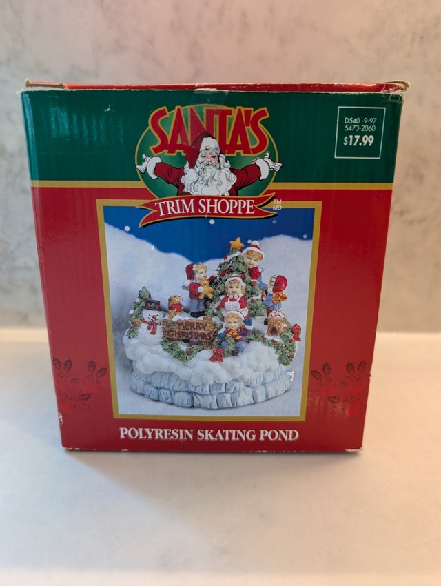 Santa's Polyresin Skating Pond Wind-up Music Box Skating Girl
