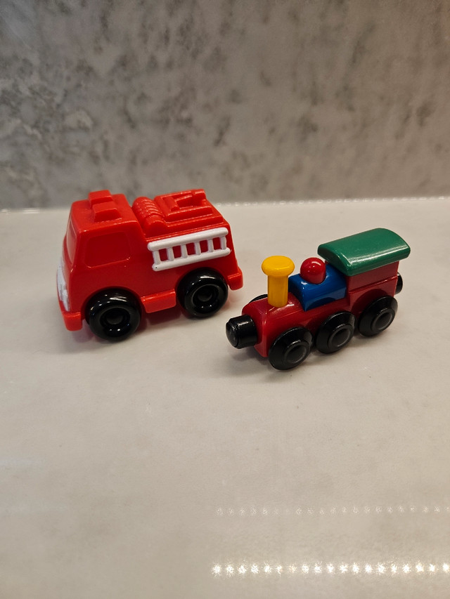 Vintage train caboose and 2000 Playskool fire truck