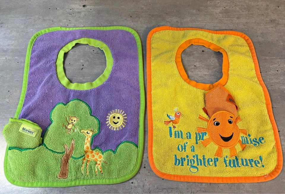 2 Baby Bibs and cloths