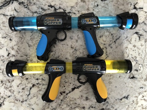 Toy guns shoot foam balls