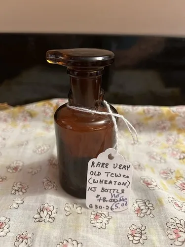 Vintage Amber Glass Apothecary Bottle Ground Stopper T.C.W. Co U