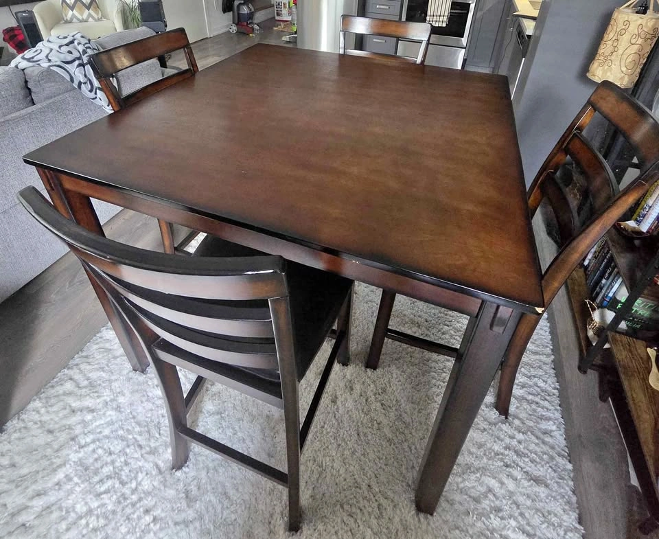 Sturdy high top Table with four chairs