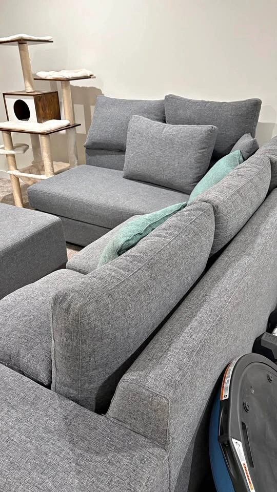 Large grey sectional and ottoman