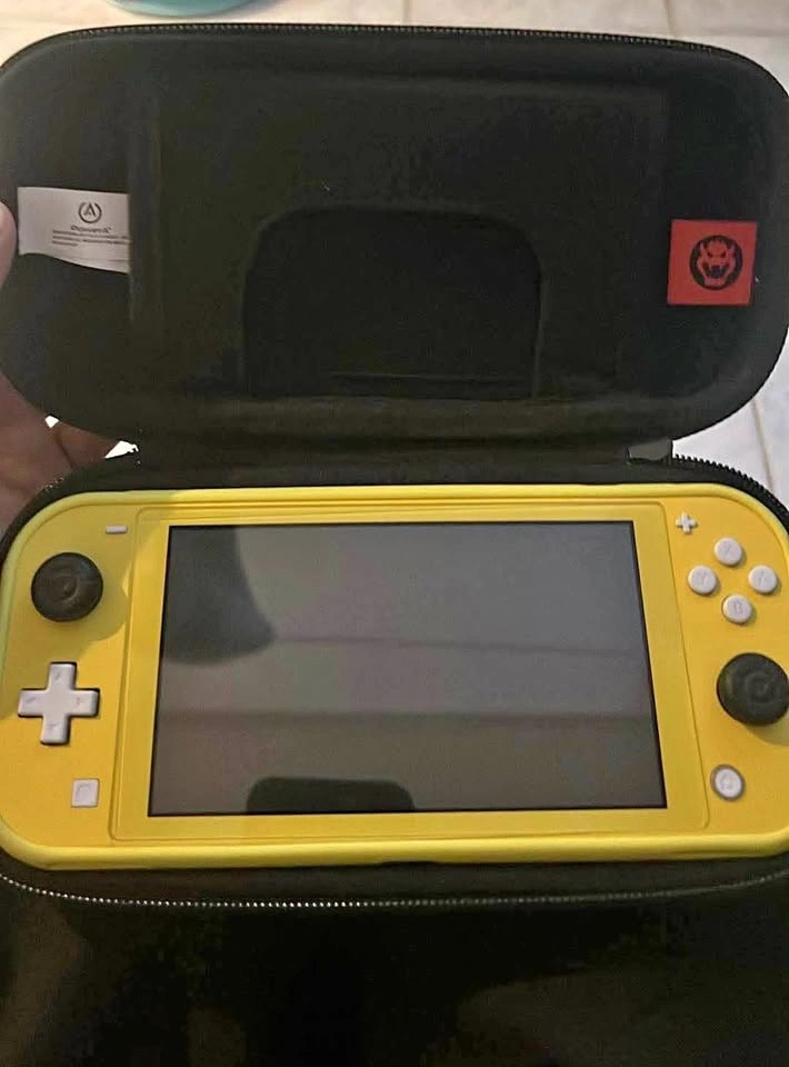 Nintendo Switch Lite with Pikachu Case and Mario Travel Bag