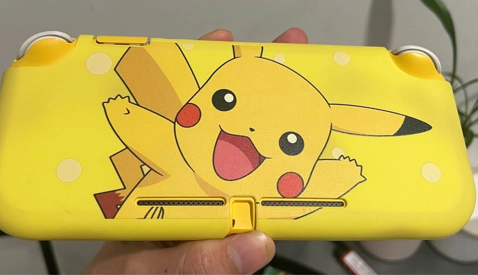 Nintendo Switch Lite with Pikachu Case and Mario Travel Bag - photo 2