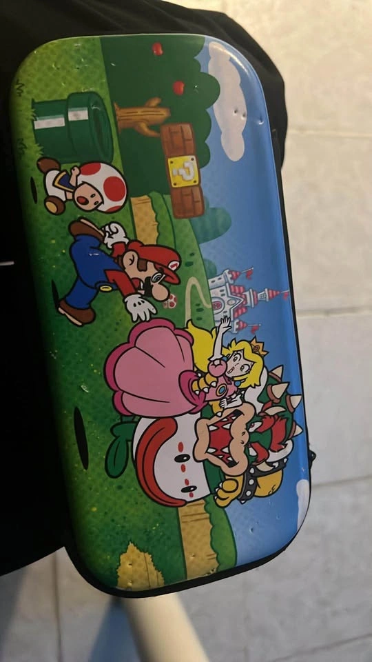 Nintendo Switch Lite with Pikachu Case and Mario Travel Bag - photo 3