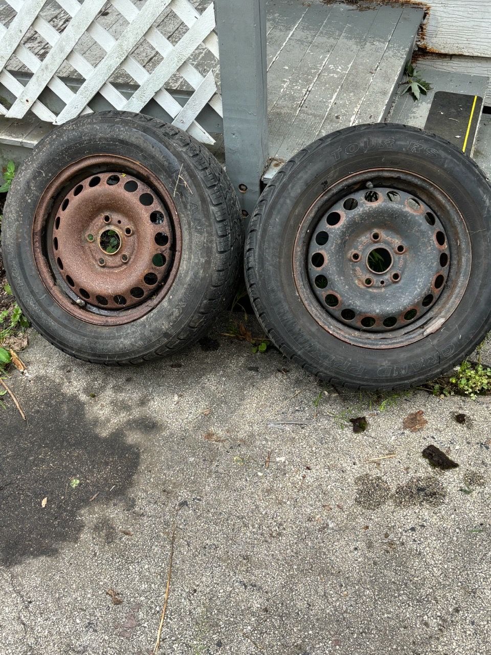 Two used tires with rim