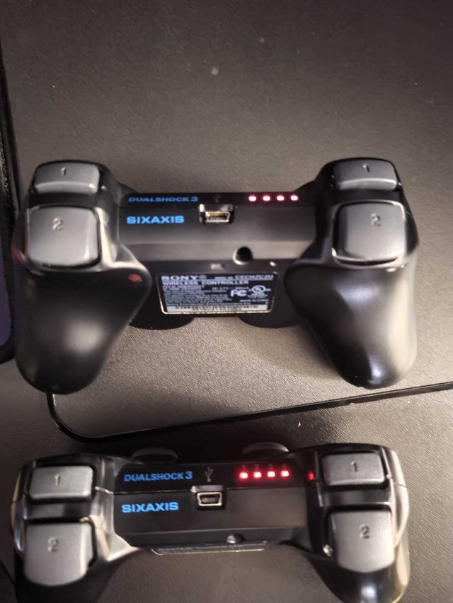 4-Sony Dualshock 3 Wireless Controllers - photo 2