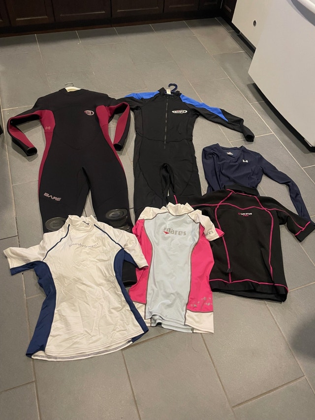 3 full lycra suits, 4 ladies sunshirts and full wetsuit
