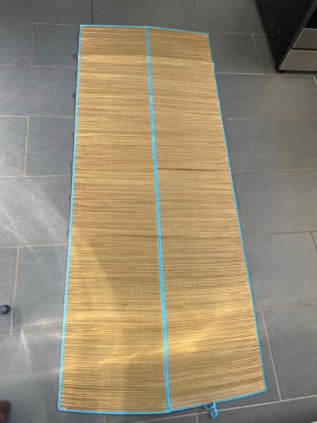 Woven grass beach mat