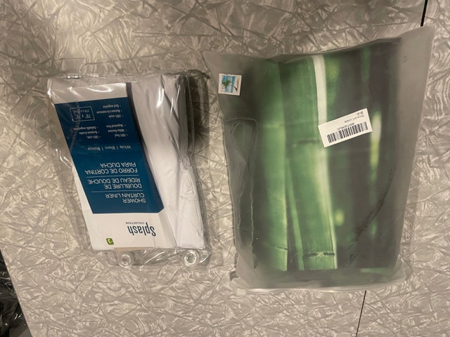 New green bamboo shower curtain and white curtain liner