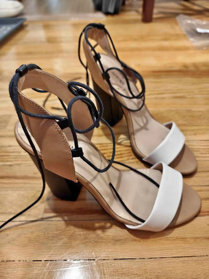Black and white lace up block heels