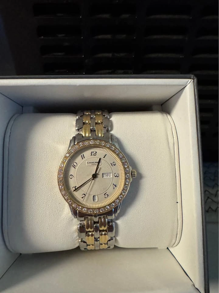 Chaumet watch 18k, 3ctw diamond bezel, SS. Trade for trailer