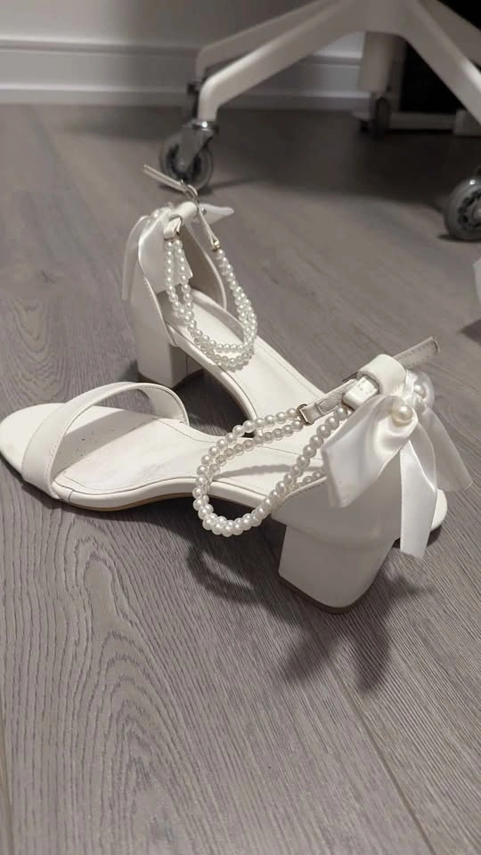 Various wedding accessories for sale (shoes, hair pins, veils)