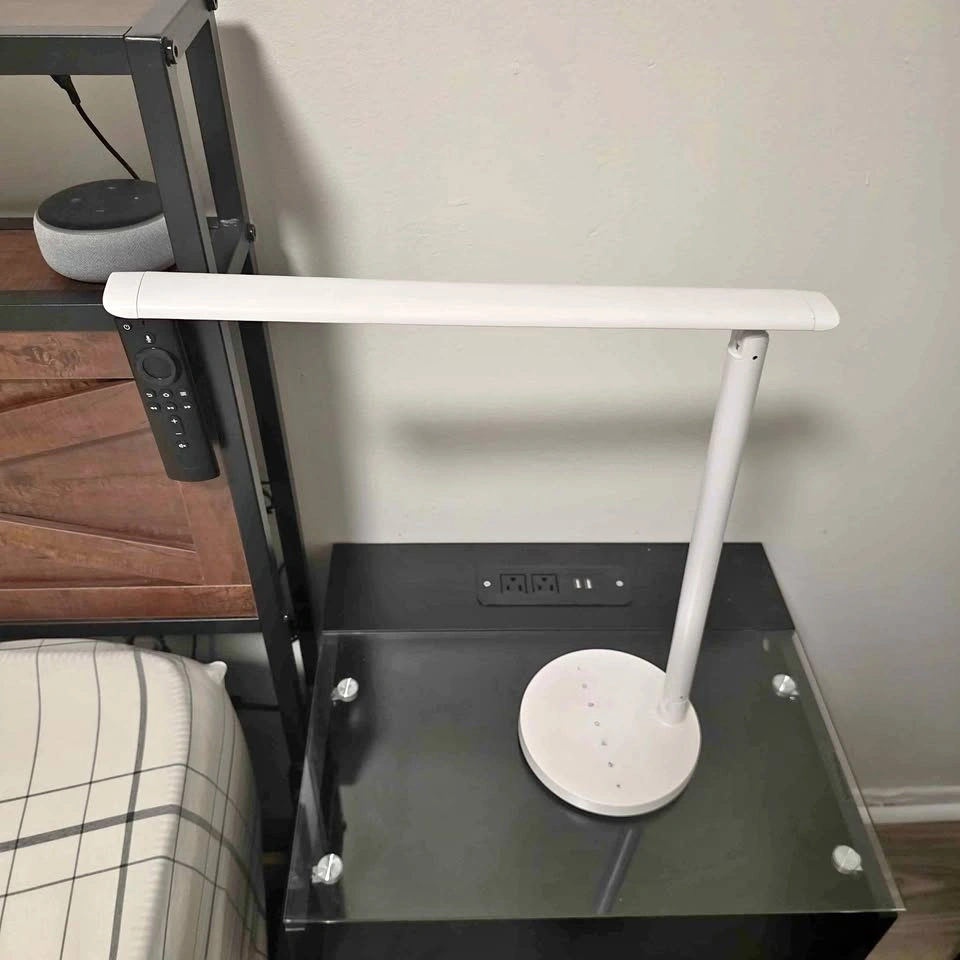 LED desk lamp with touch functionality and different modes
