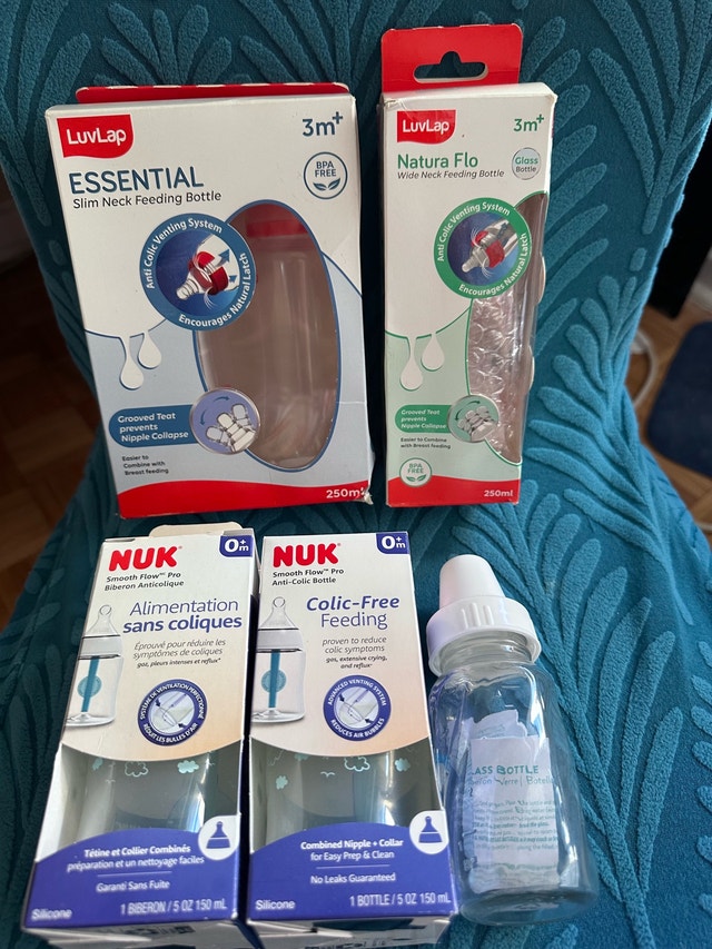 BRAND NEW feeding bottles- NUK, luvlap and evenflo