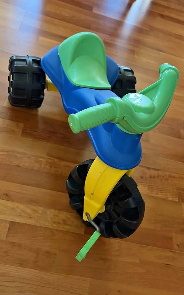 Fisher Price Tough Trike Blue Green three-wheeled riding toy