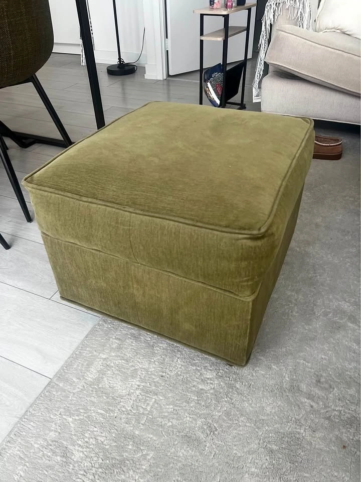 Green fabric foot stool
