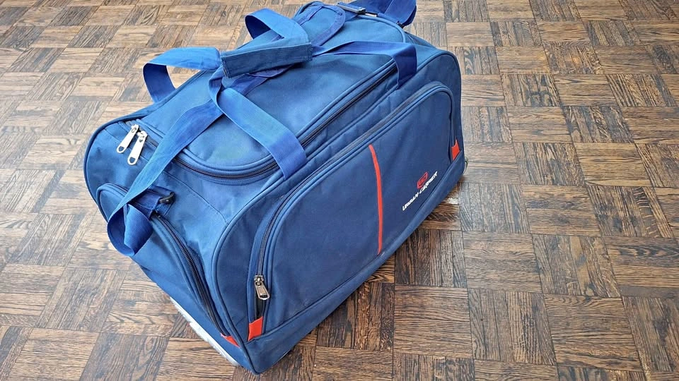 Urban Carrier Thick fabric Rolling Duffel Bag