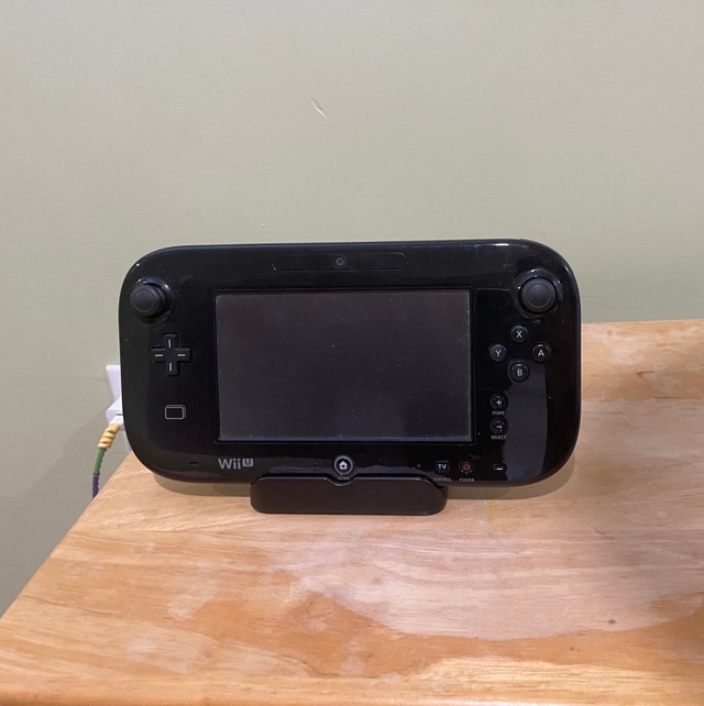 Wii U with two pro controllers and games - photo 2