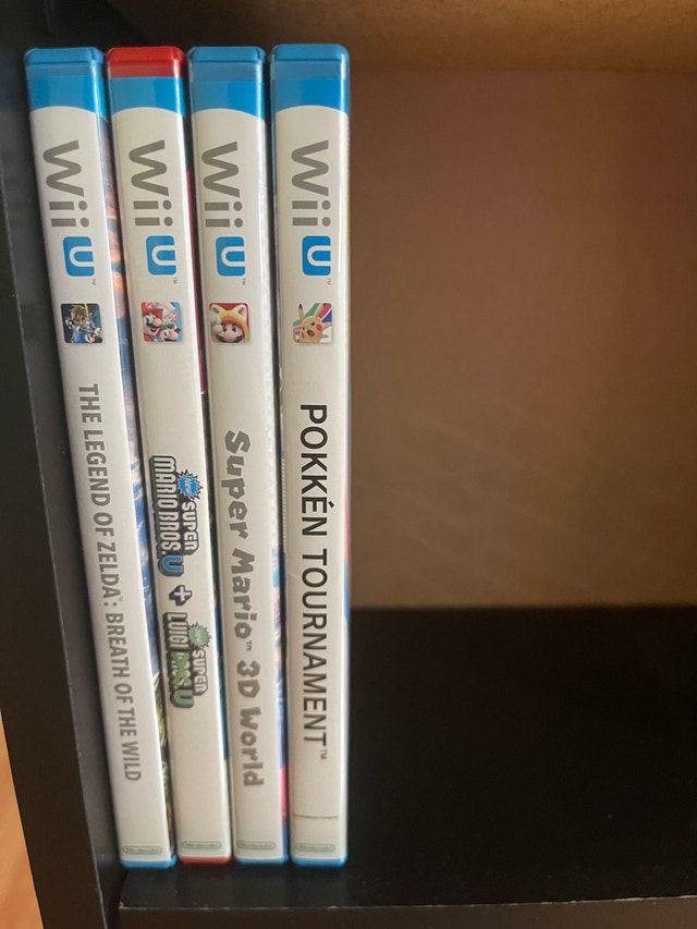 Wii U with two pro controllers and games - photo 3