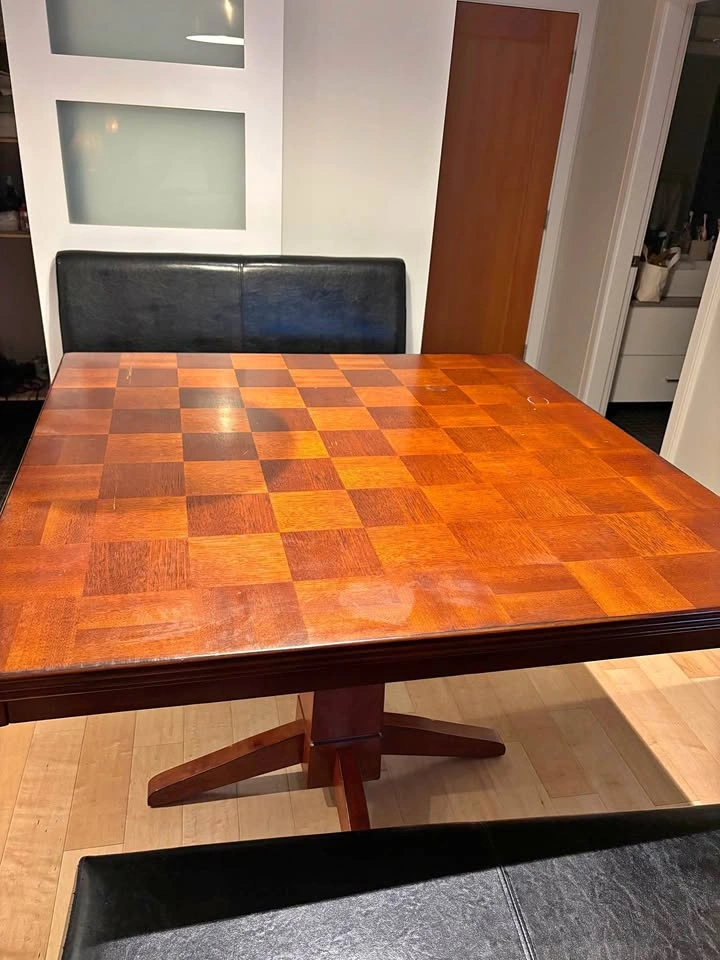Kitchen table with two benches and a chair