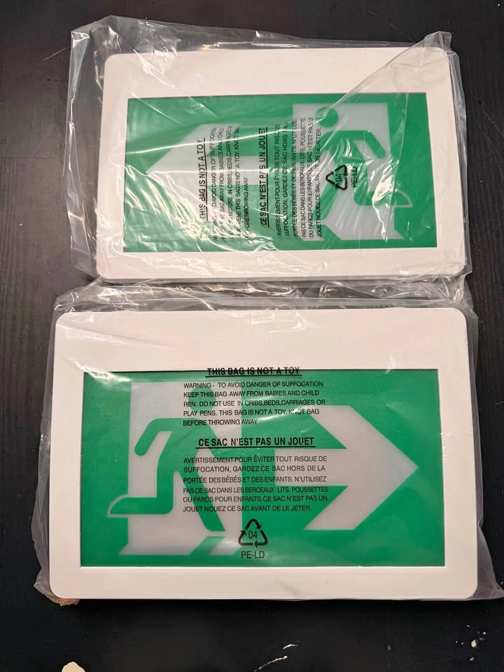 TANLUX Running Man Exit Sign