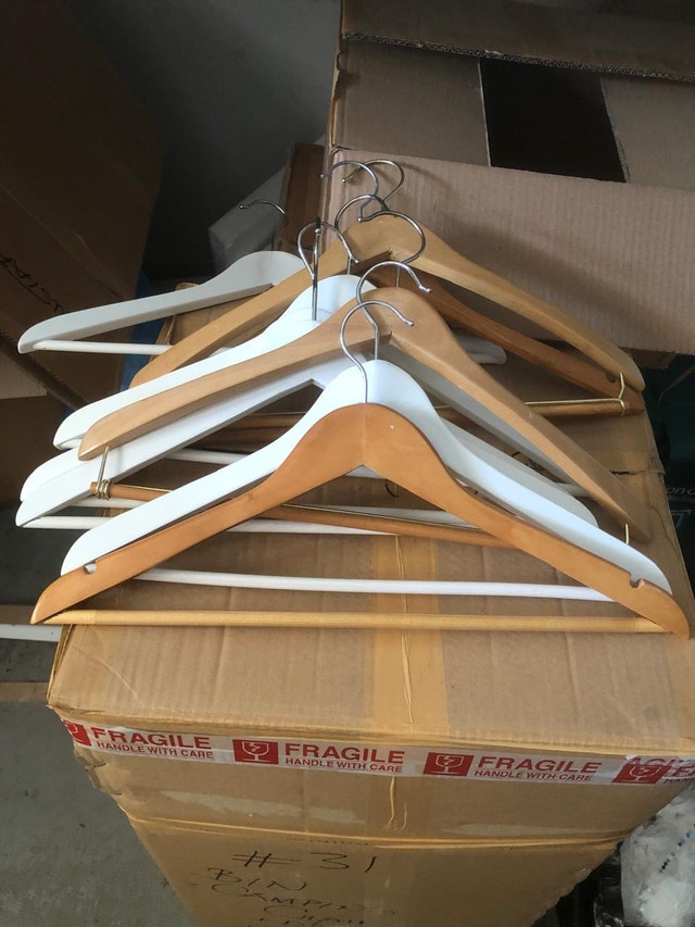 Assorted Wooden and Plastic Clothes Hangers