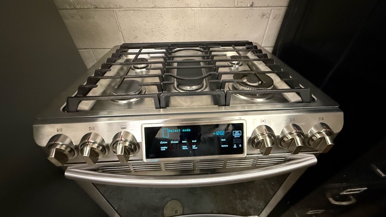 Stove, refrigerator and microwave stainless steel appliances - photo 2