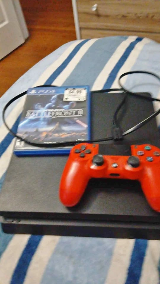 Ps4 with red controller and bf2 and power cord