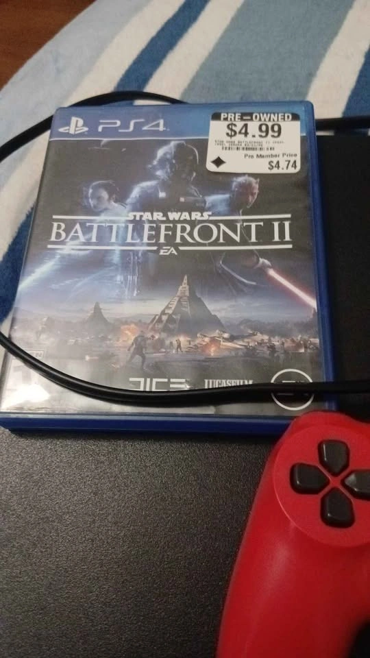 Ps4 with red controller and bf2 and power cord - photo 2