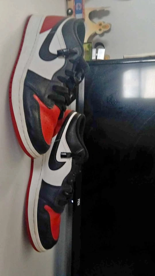 Red air jordans with tieless laces