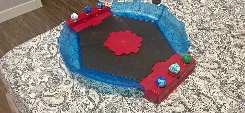 Bakugan stadium with bakugans and case