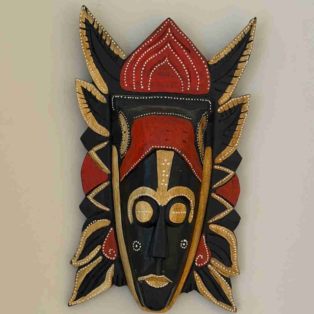 Hand carved wooden wall mask