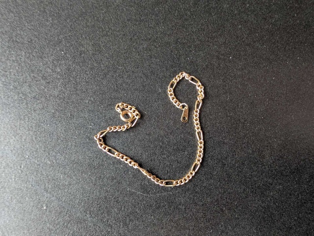 Gold tone Figaro Chain Bracelet