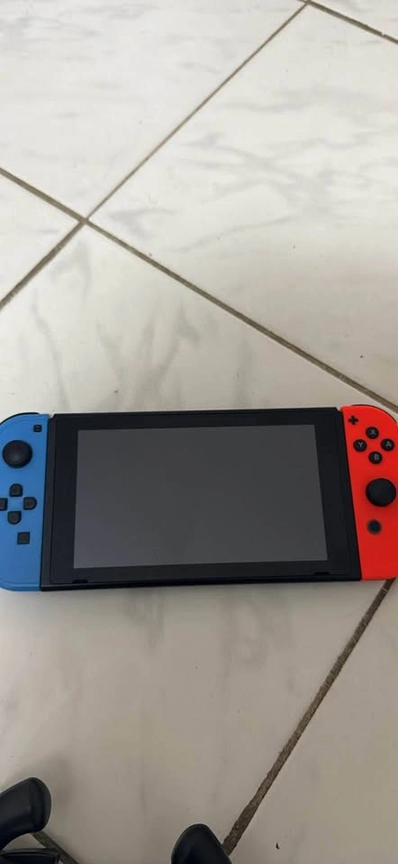Nintendo Switch and Accessories with Extra Controllers - photo 2